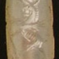 Hero grasping lion-griffin on either side