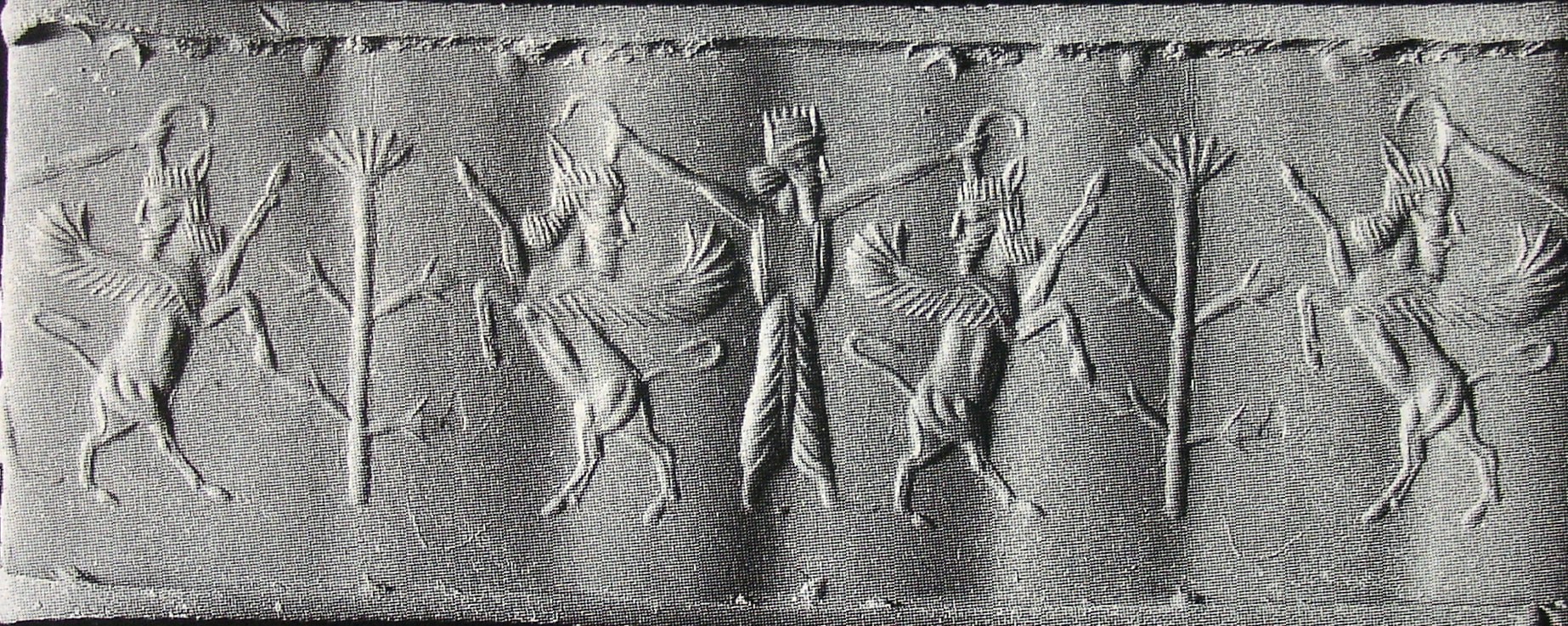 Royal hero grasping human-faced winged wild goat (ibex) on either side