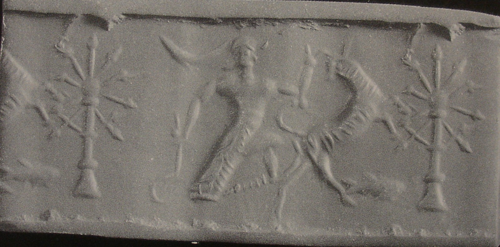 Hero fighting bull beside stylised tree