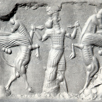 Hero grasping winged bull on either side