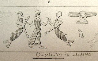 Hero grasping fish-man (kulullu) on either side