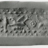 Stamp-cylinder seal: two reclining lion-griffins flanking ear of wheat ('bottle-brush' tree) (cylinder image) – reclining lion-griffin (stamp image)