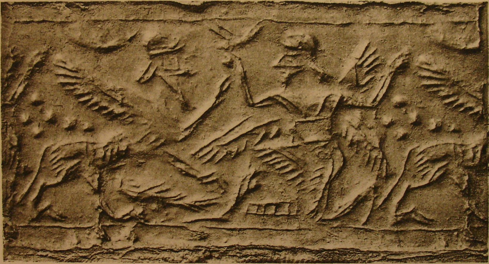 Winged hero fighting human-headed winged lion (shedu, sphinx)