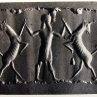 Hero grasping bull on either side