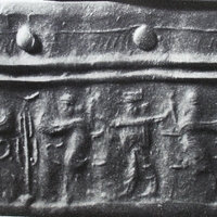 Stamp-cylinder seal: Royal hero grasping human-headed winged lion (shedu, sphinx) on either side (cylinder image) – horned animal below a crescent moon (stamp image) – eight-rayed star (stamp image on the handle)