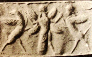 Winged hero grasping griffin and human-headed winged lion (shedu, sphinx)